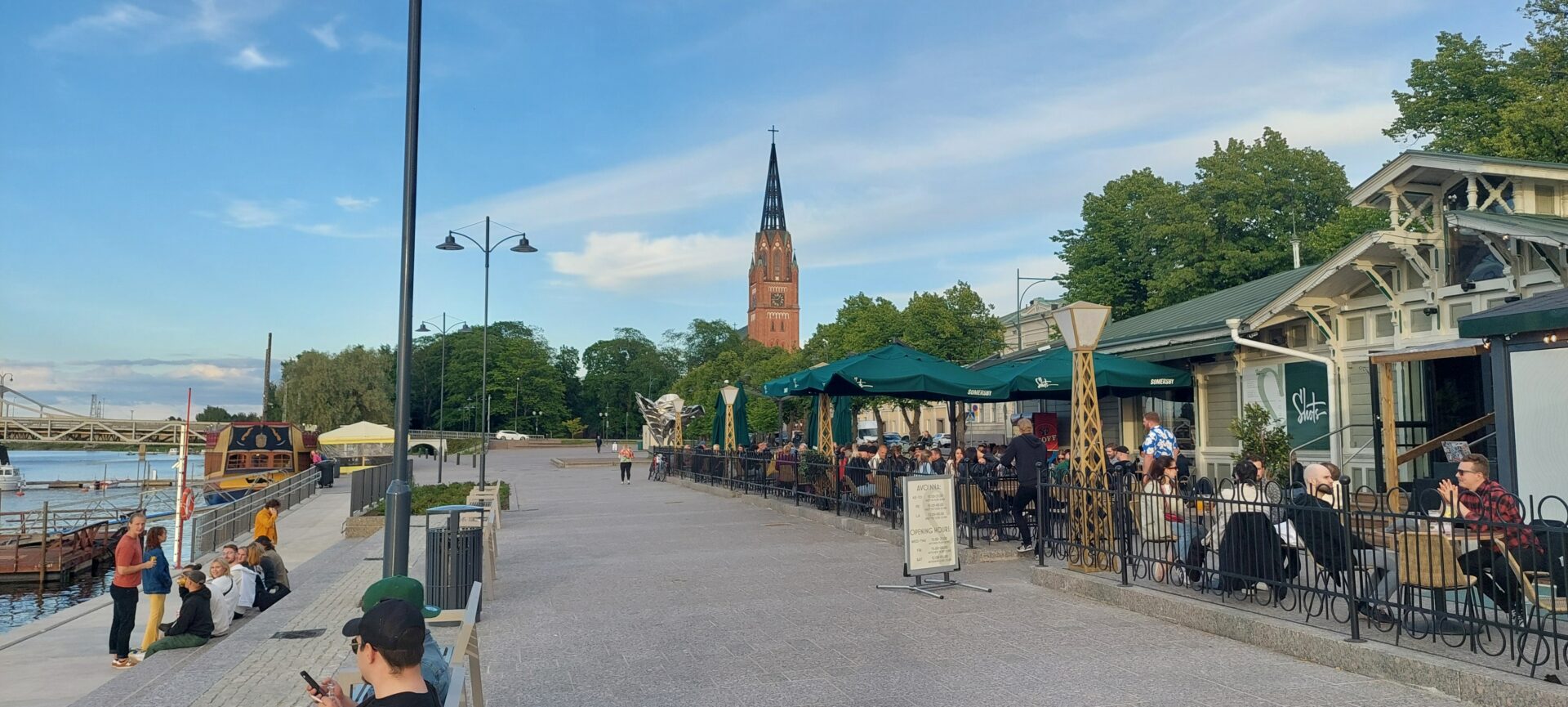 Riverside landscape with Shots restaurant and Keski-Pori church