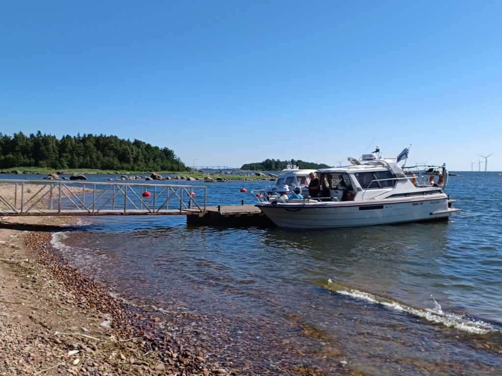A boat at a dock by the seahore