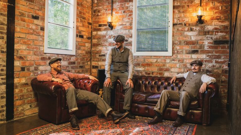 Gentlemanni_gentlemen in waistcoats and headgear.