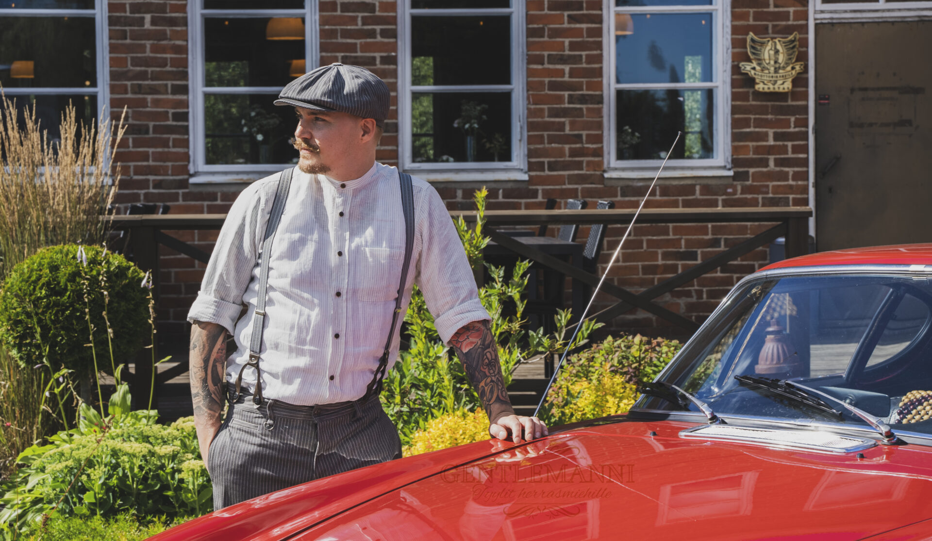 Gentlemanni_gentleman leaning against the car in his outfit and hat