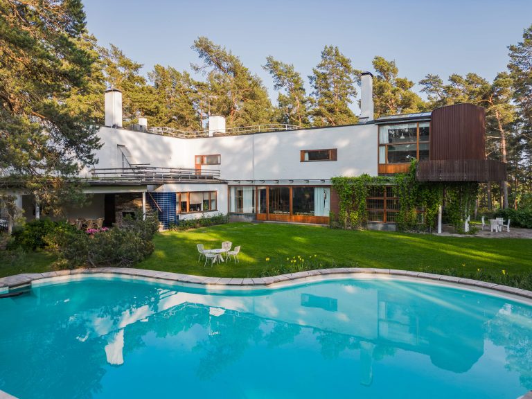 There is a swimming pool in the backyard of Villa Mairea.