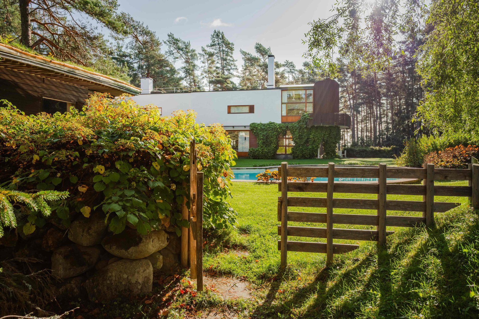The gate in the backyard of Villa Mairea, leading to the swimming pool.