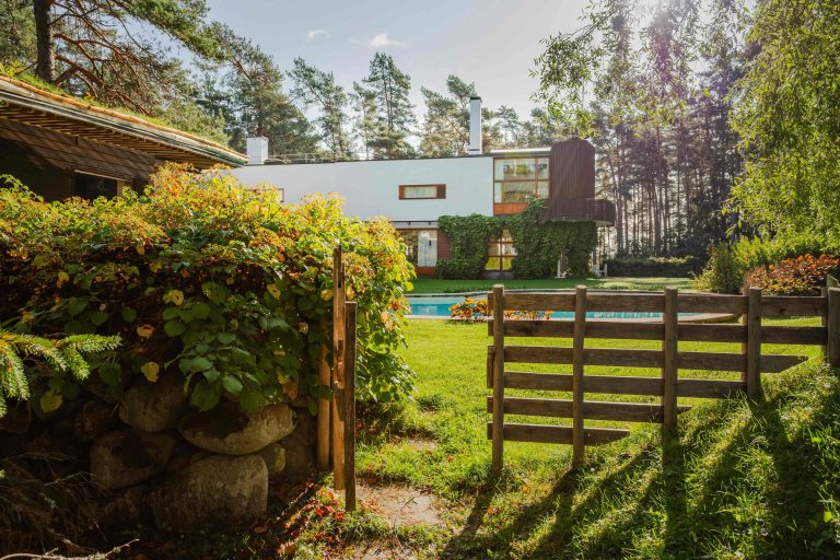 The gate in the backyard of Villa Mairea, leading to the swimming pool.